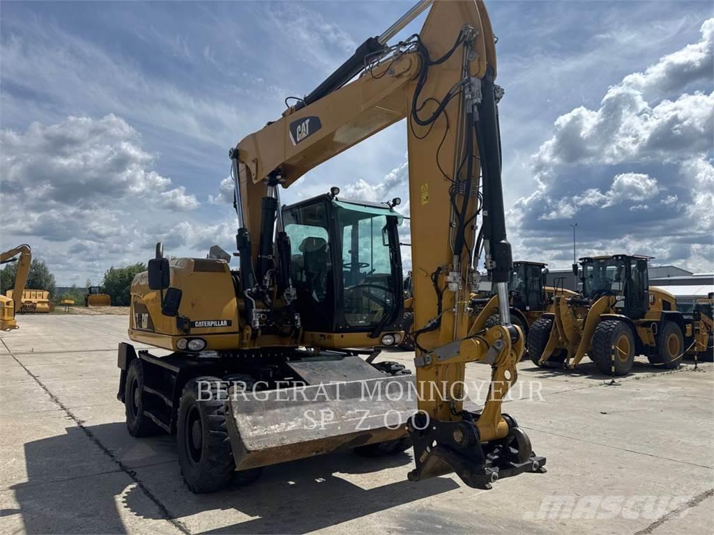 CAT M313D Ekskavatori uz riteņiem