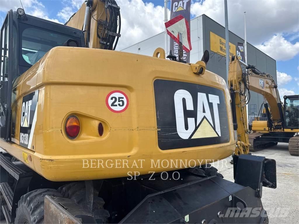 CAT M313D Ekskavatori uz riteņiem