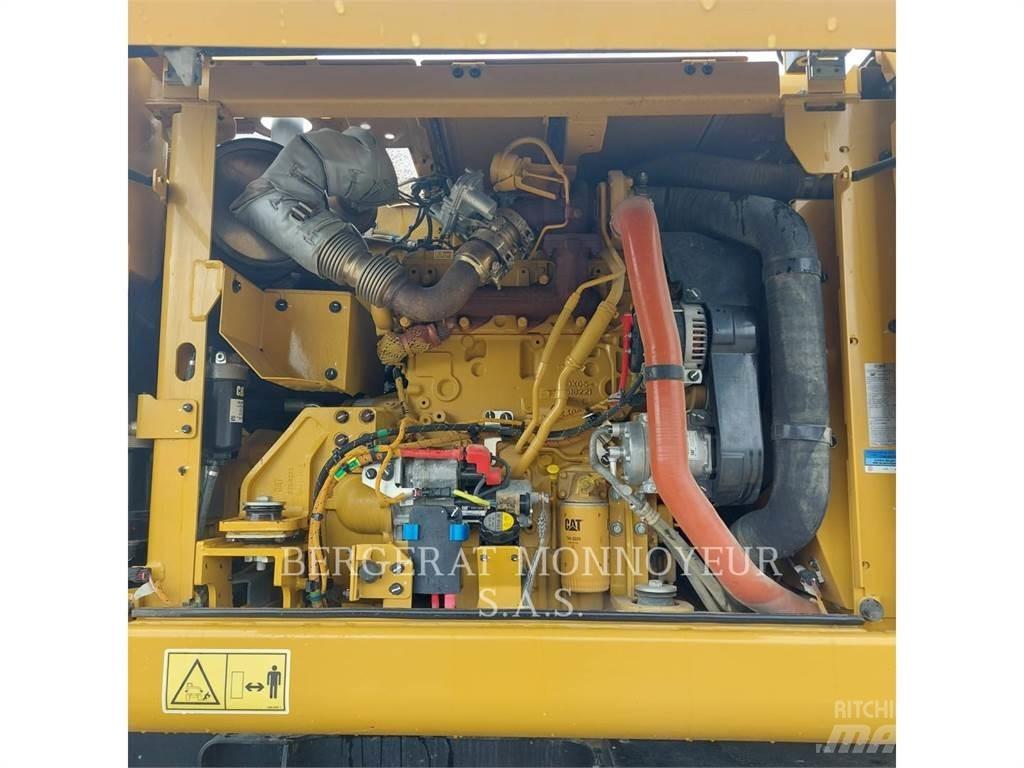 CAT M315 Ekskavatori uz riteņiem