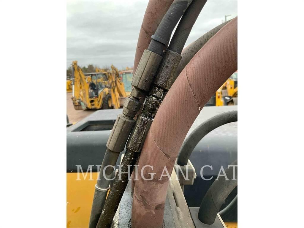 CAT M315 Ekskavatori uz riteņiem