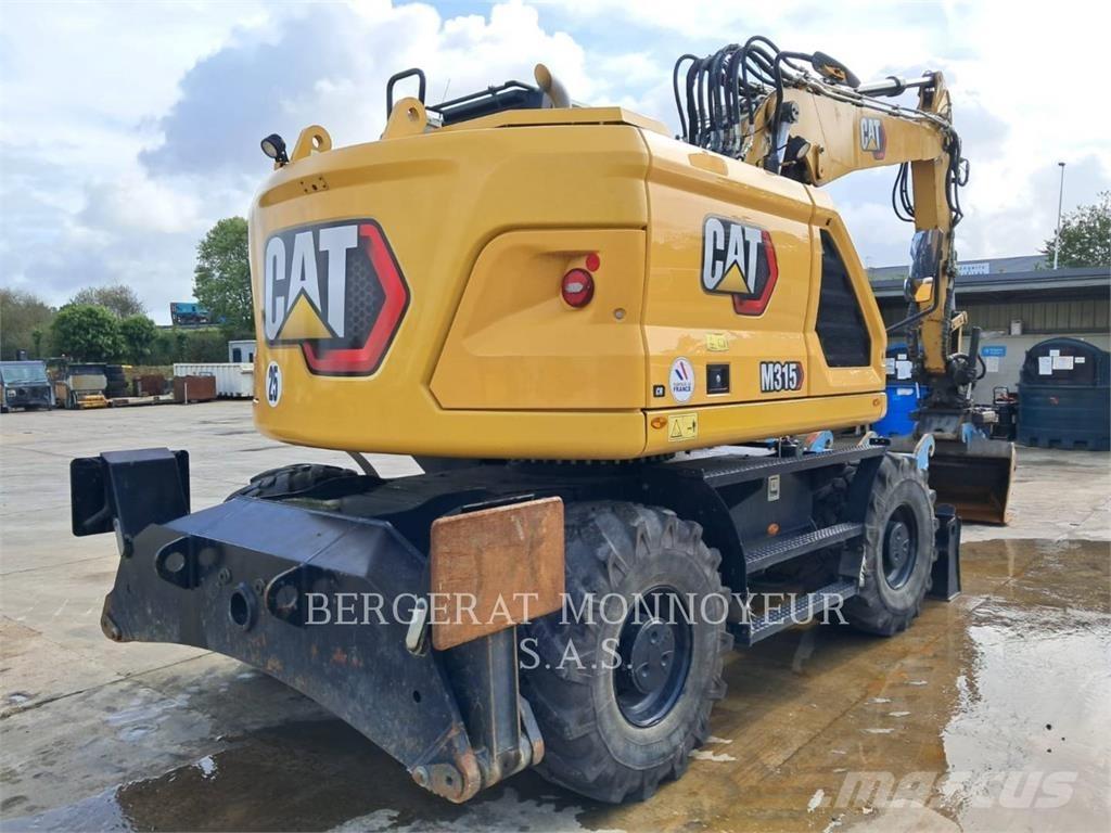 CAT M315 Ekskavatori uz riteņiem