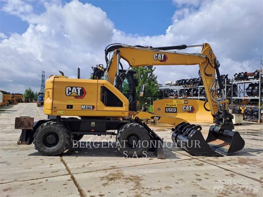 CAT M315 Ekskavatori uz riteņiem