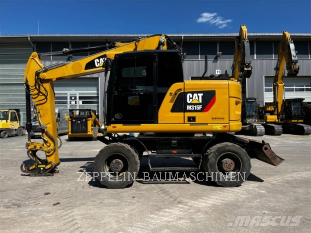 CAT M315F Ekskavatori uz riteņiem