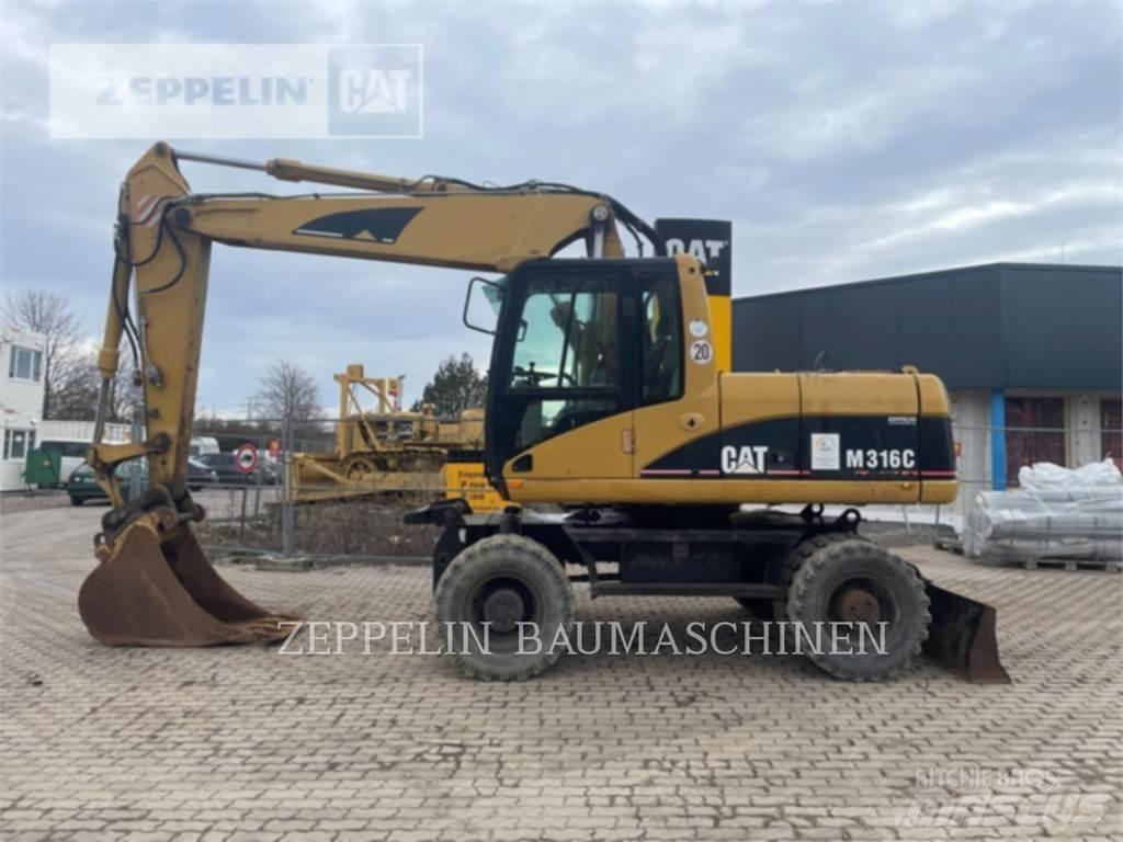 CAT M316C Ekskavatori uz riteņiem