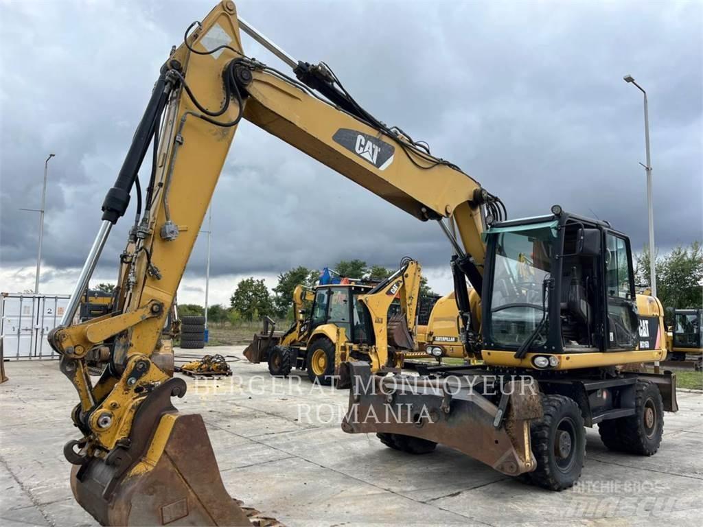 CAT M316D Ekskavatori uz riteņiem