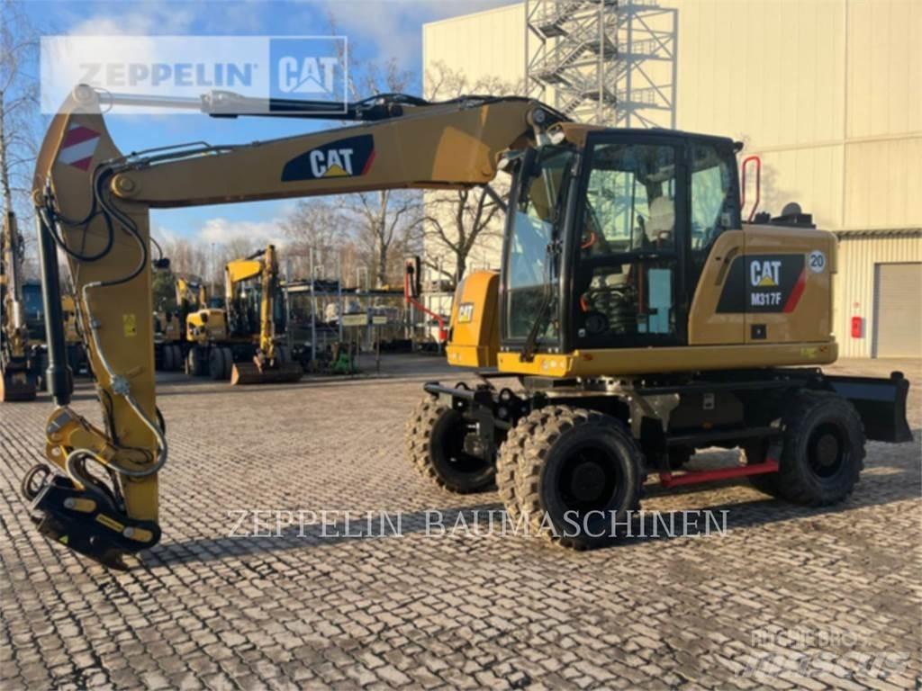 CAT M317F Ekskavatori uz riteņiem