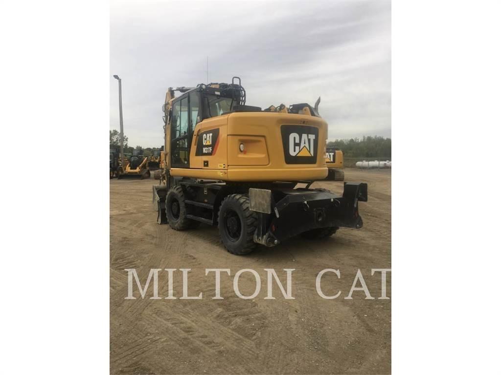 CAT M317F Ekskavatori uz riteņiem