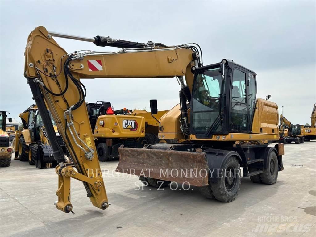 CAT M318 Ekskavatori uz riteņiem