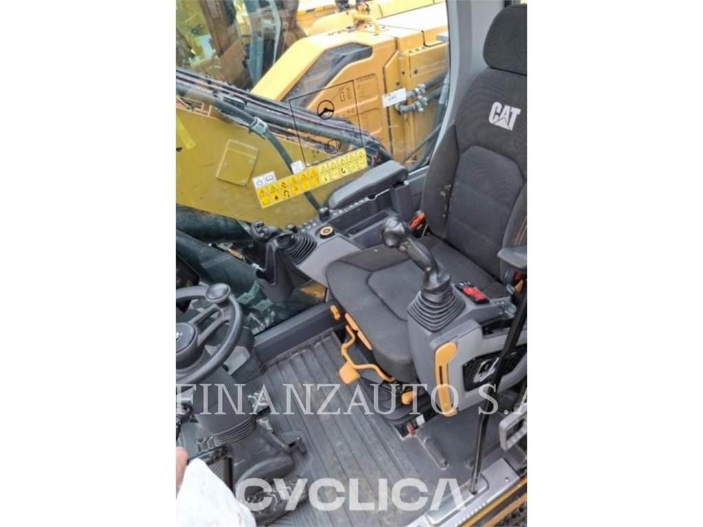 CAT M318 Ekskavatori uz riteņiem