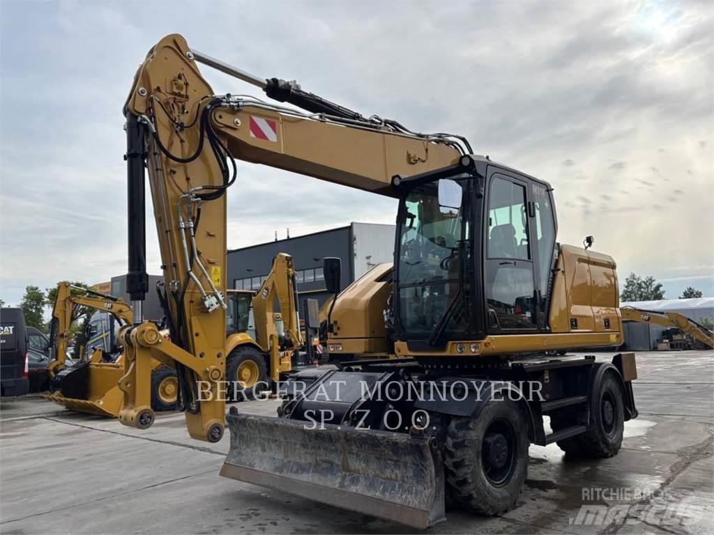 CAT M318 Ekskavatori uz riteņiem
