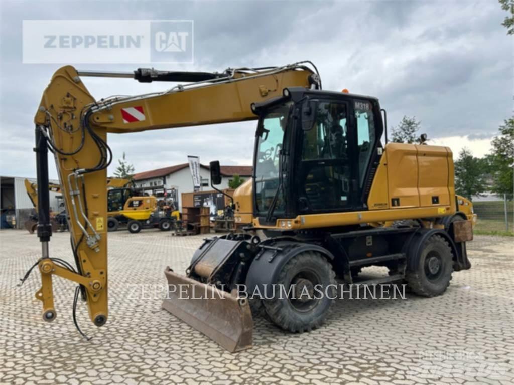 CAT M318-07A Ekskavatori uz riteņiem