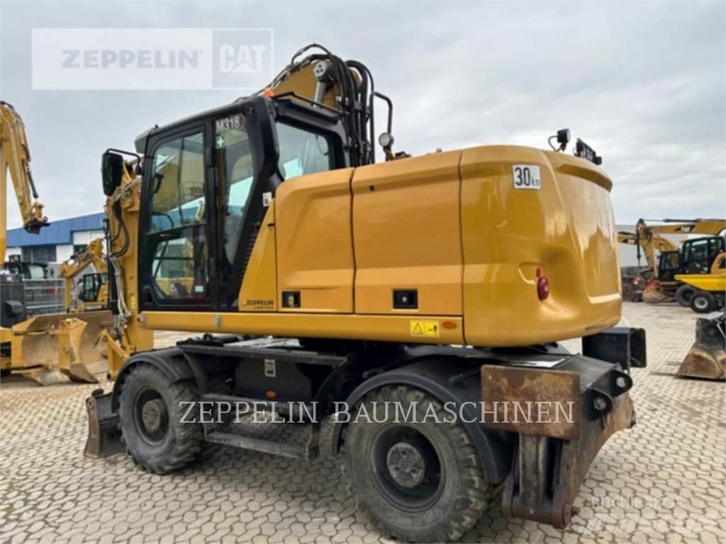 CAT M318-07A Ekskavatori uz riteņiem