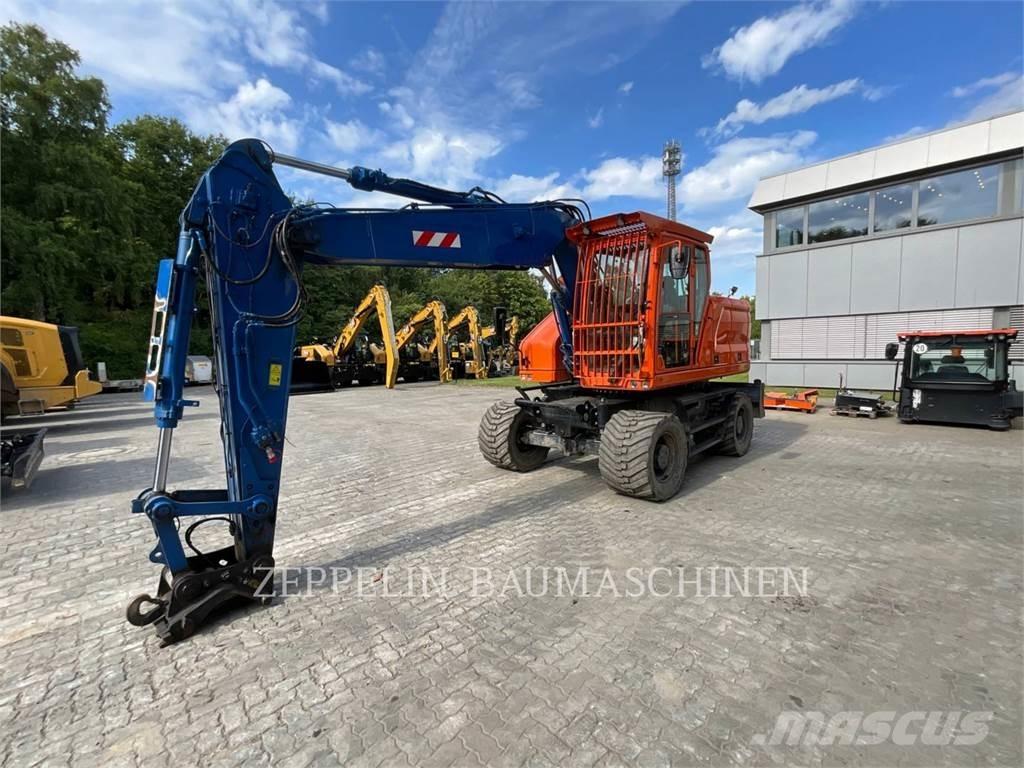 CAT M318-07A Ekskavatori uz riteņiem