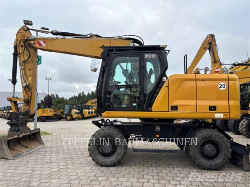 CAT M318-07A Ekskavatori uz riteņiem