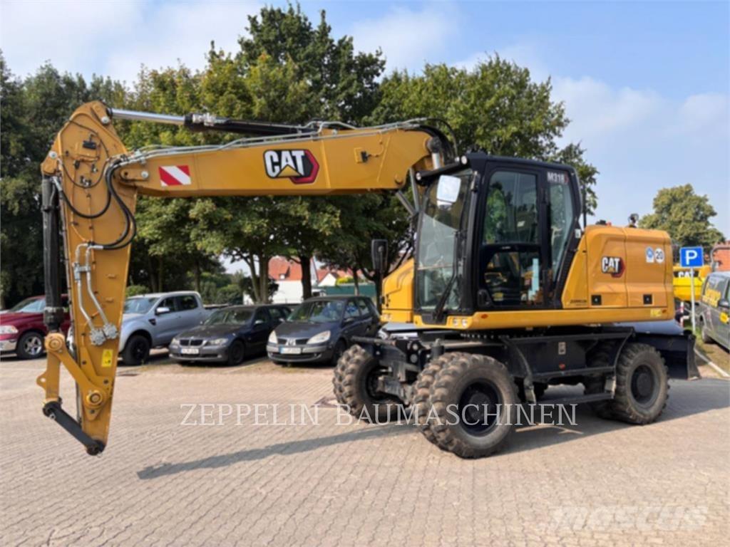CAT M318-07A Ekskavatori uz riteņiem