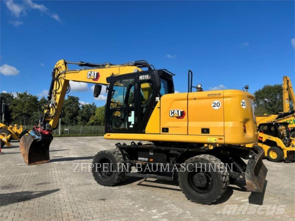 CAT M318-07A Ekskavatori uz riteņiem
