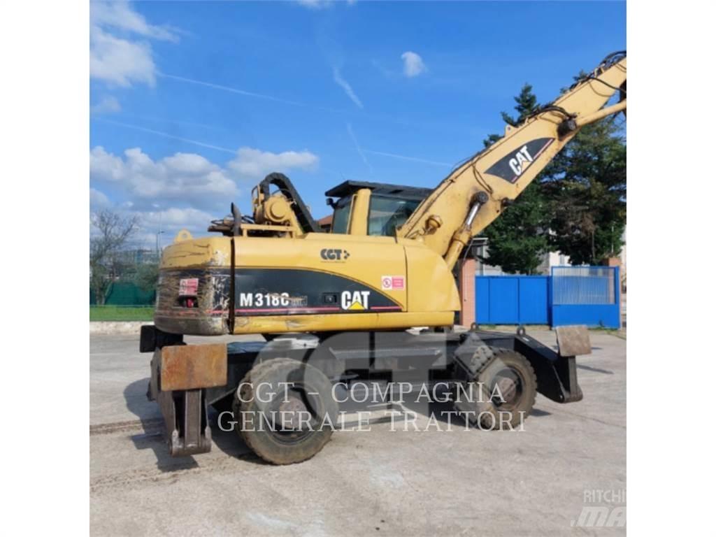 CAT M318C Ekskavatori uz riteņiem