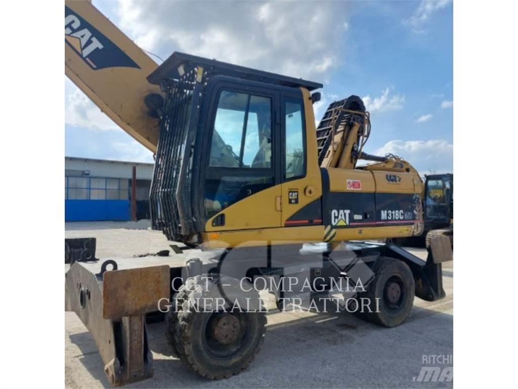 CAT M318C Ekskavatori uz riteņiem