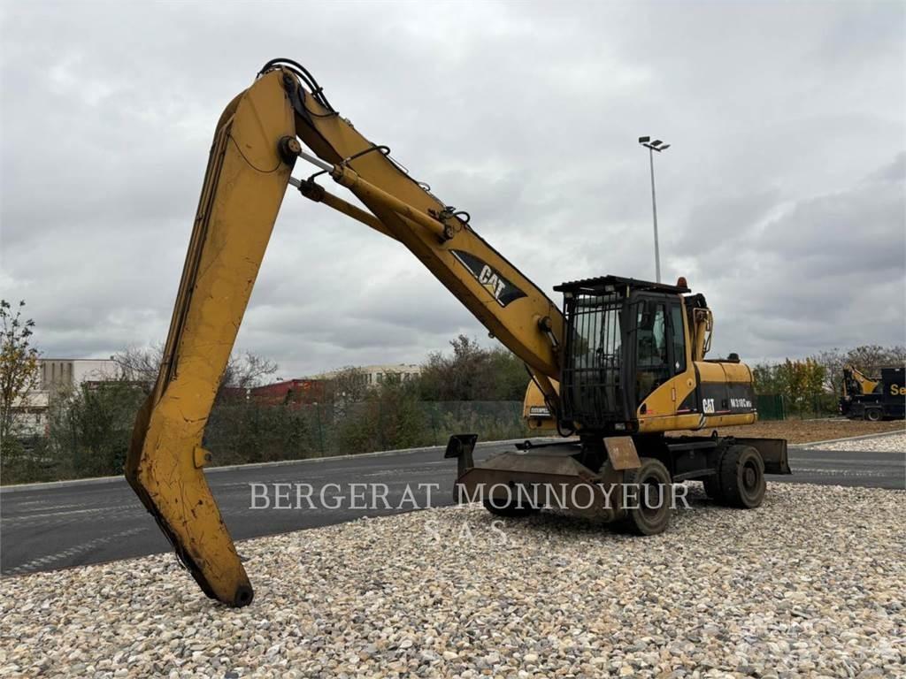 CAT M318C Ekskavatori uz riteņiem