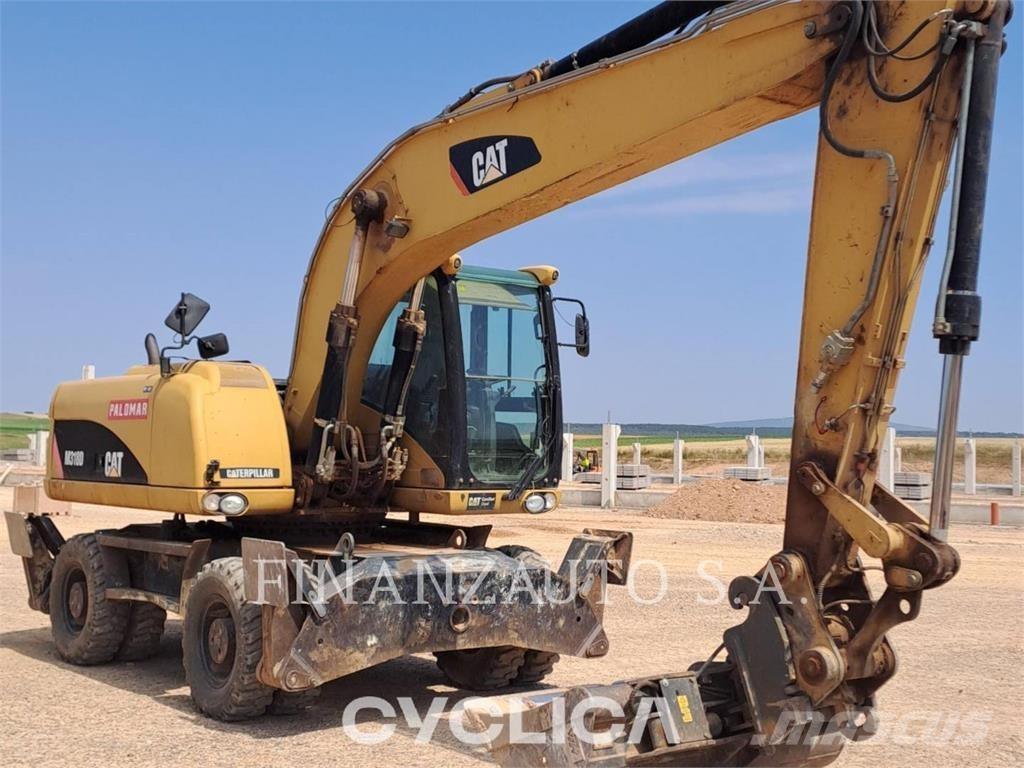 CAT M318D Ekskavatori uz riteņiem