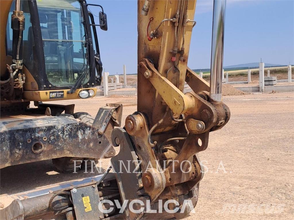 CAT M318D Ekskavatori uz riteņiem