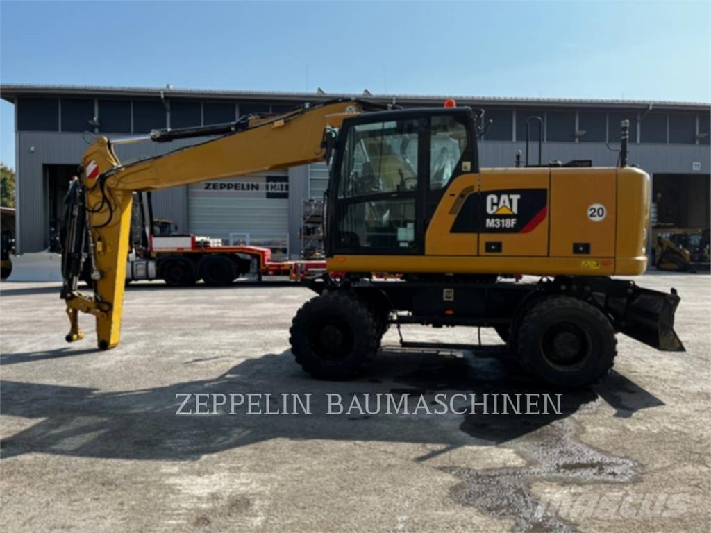 CAT M318F Ekskavatori uz riteņiem