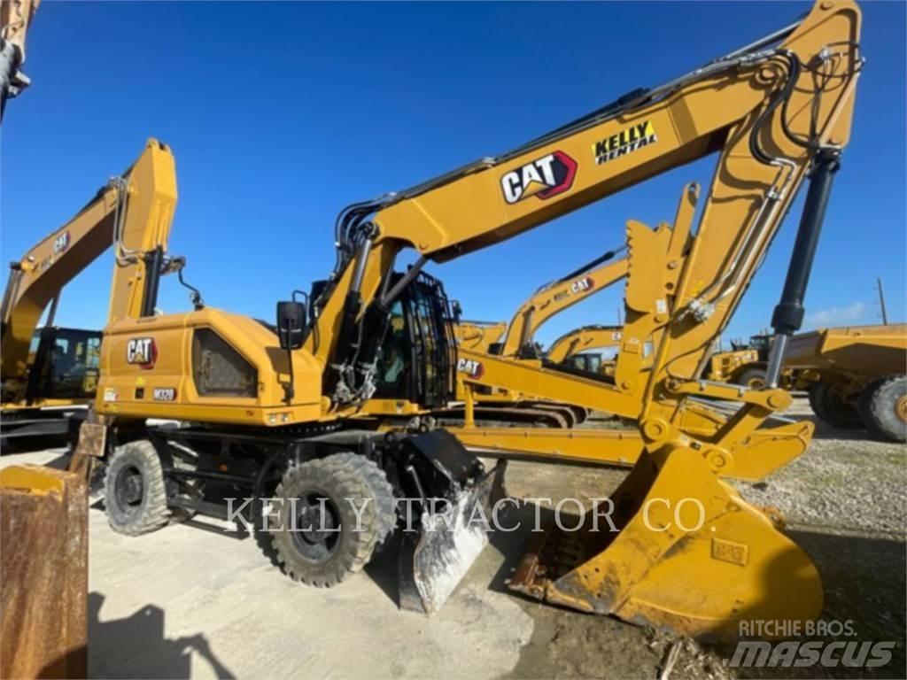 CAT M320 Ekskavatori uz riteņiem