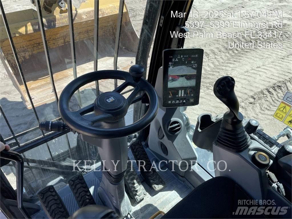 CAT M320 Ekskavatori uz riteņiem