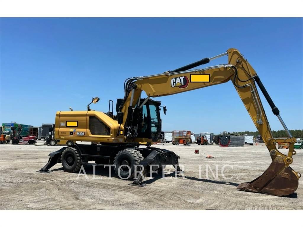 CAT M320 Ekskavatori uz riteņiem
