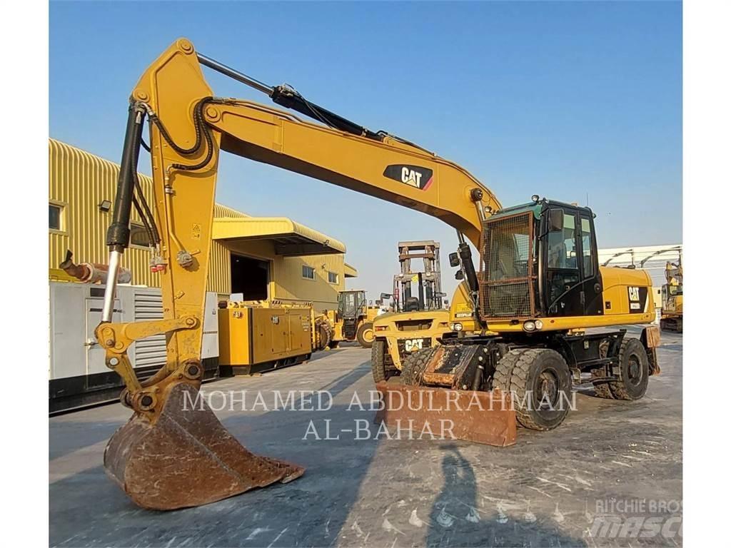 CAT M320D2 Ekskavatori uz riteņiem