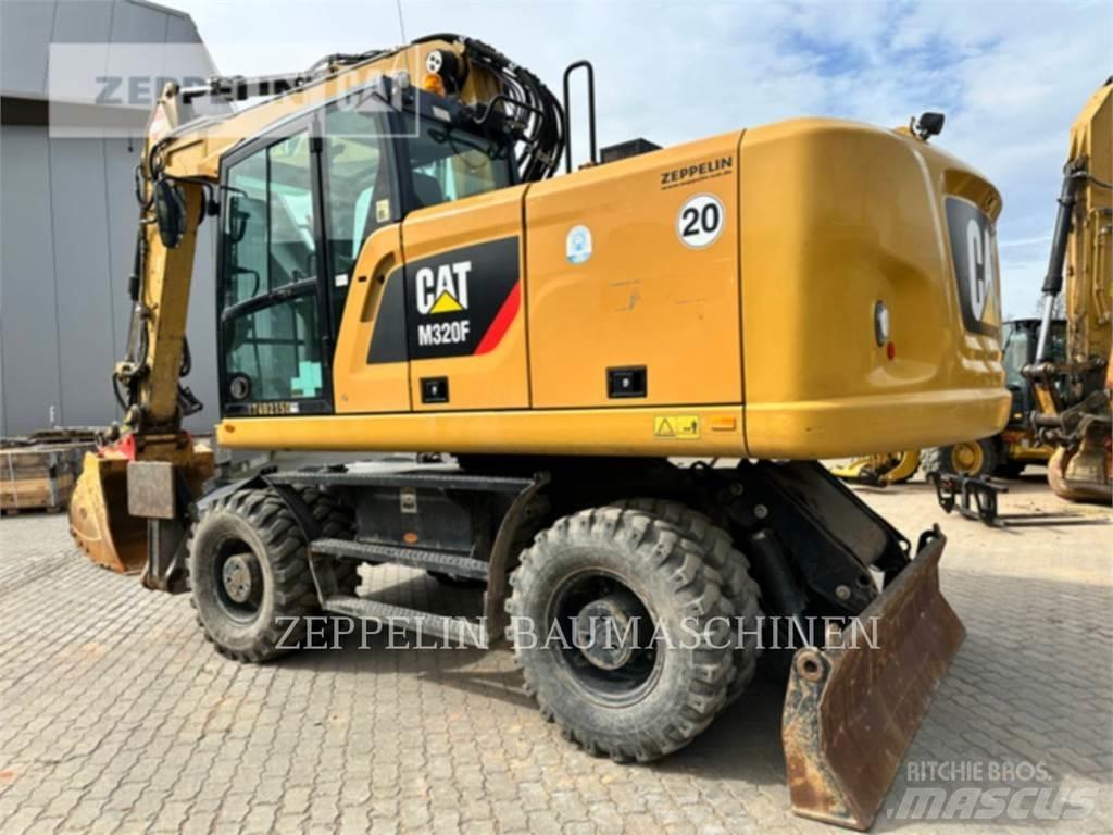 CAT M320F Ekskavatori uz riteņiem