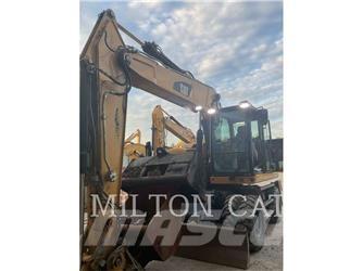 CAT M320F Ekskavatori uz riteņiem