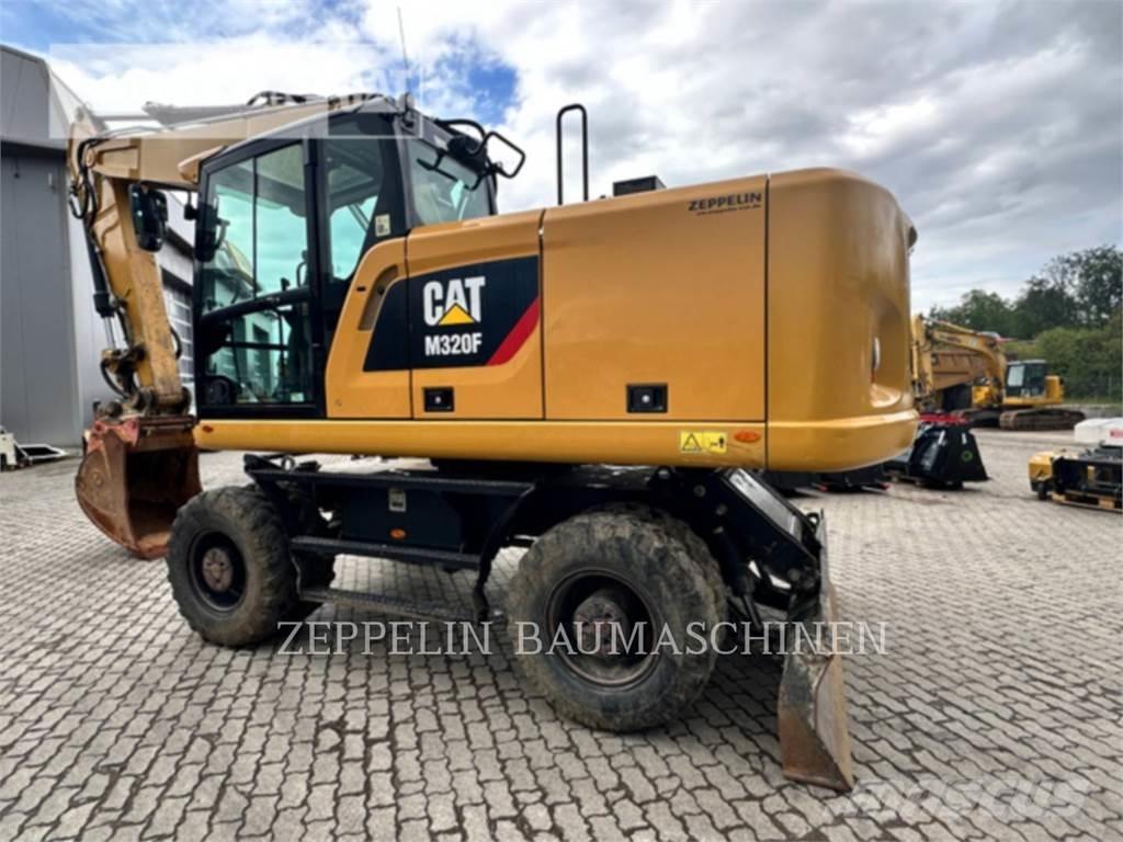 CAT M320F Ekskavatori uz riteņiem