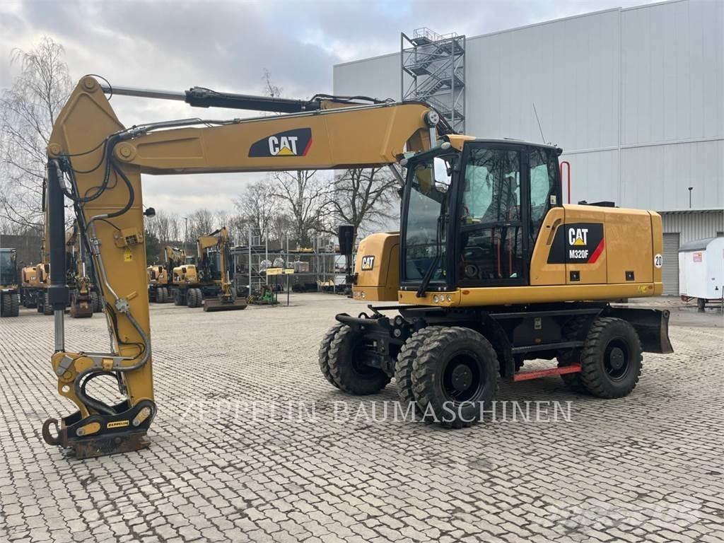 CAT M320F Ekskavatori uz riteņiem