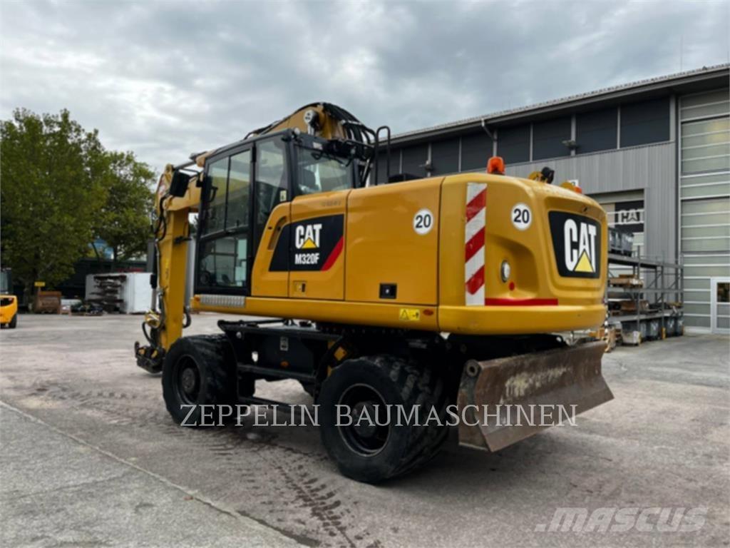 CAT M320F Ekskavatori uz riteņiem