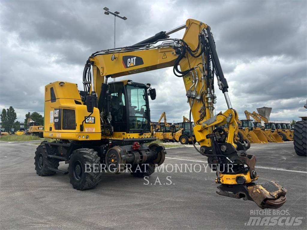 CAT M323F Ekskavatori uz riteņiem