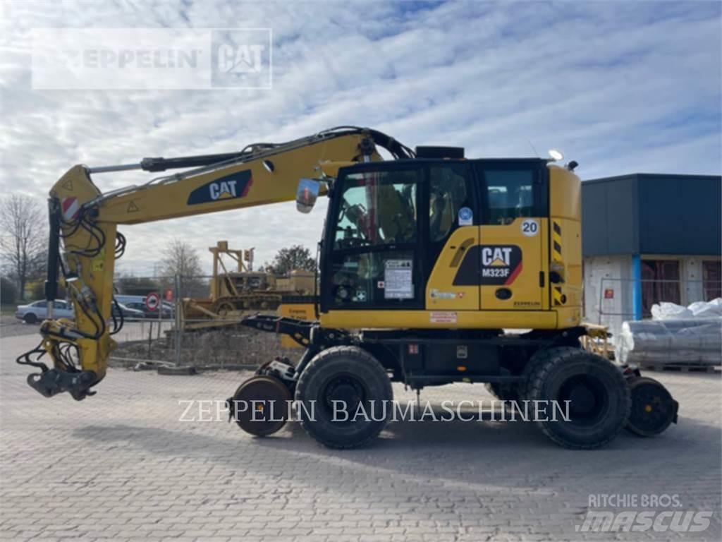 CAT M323F Ekskavatori uz riteņiem