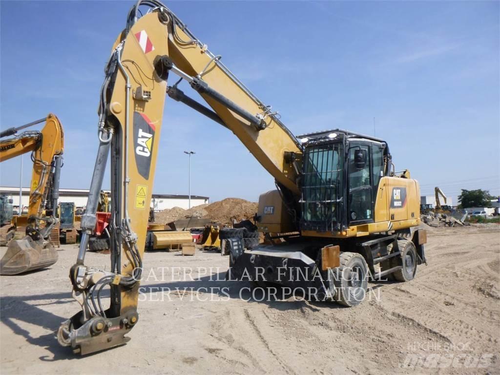 CAT MH3022-06 Ekskavatori uz riteņiem