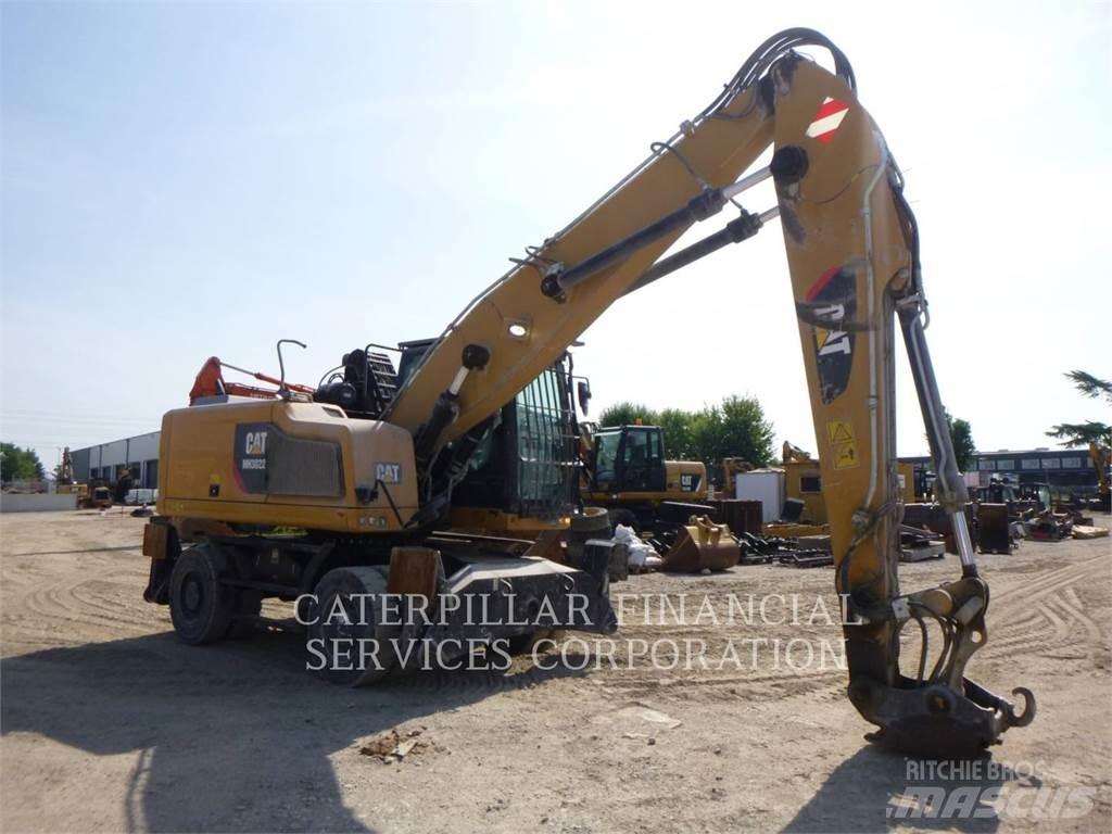 CAT MH3022-06 Ekskavatori uz riteņiem