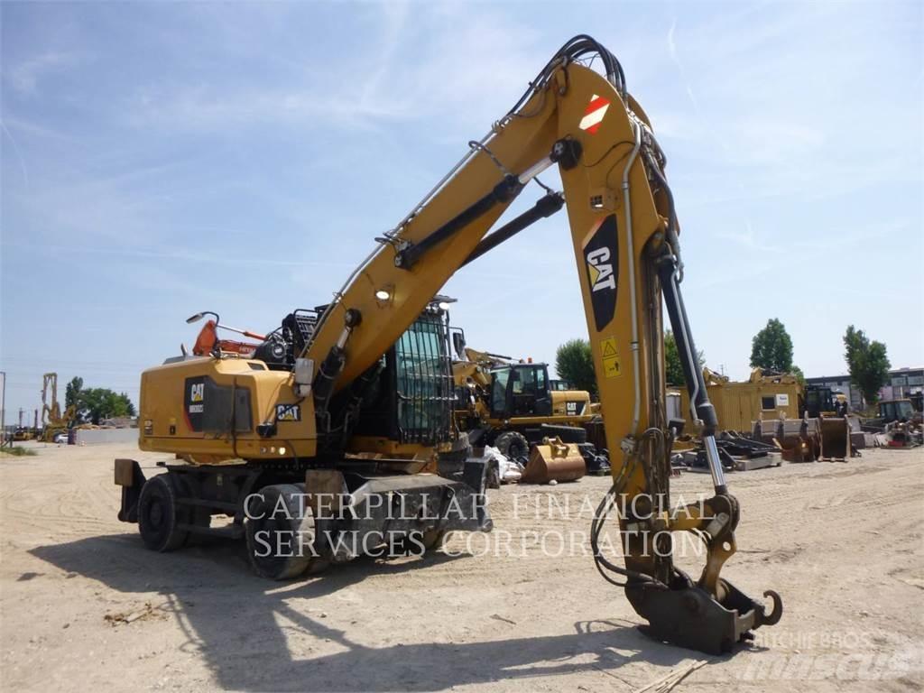 CAT MH3022-06 Ekskavatori uz riteņiem
