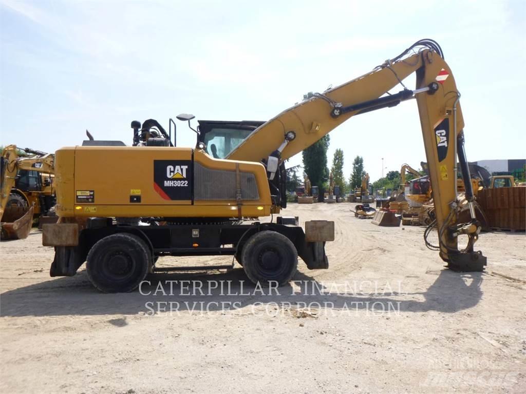 CAT MH3022-06 Ekskavatori uz riteņiem