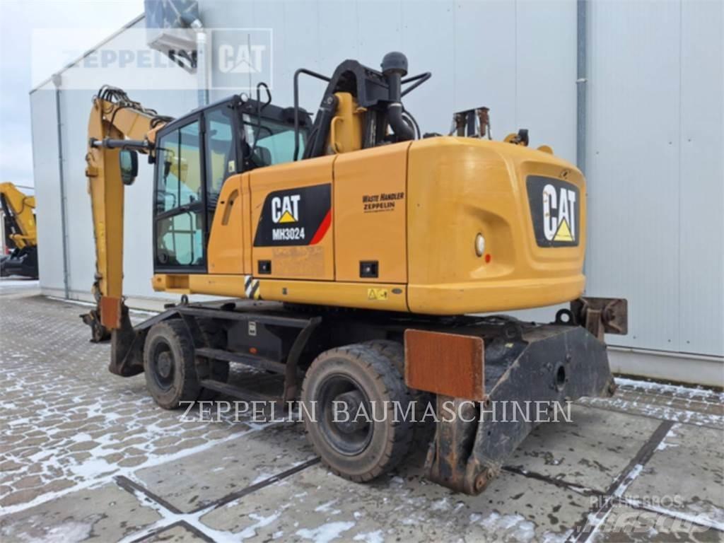 CAT MH3024-06C Demontāžas ekskavators