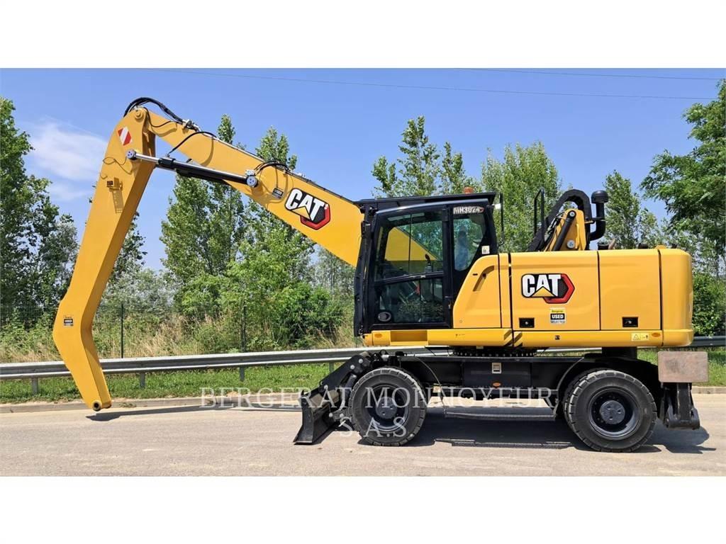 CAT MH3024-1 Ekskavatori uz riteņiem