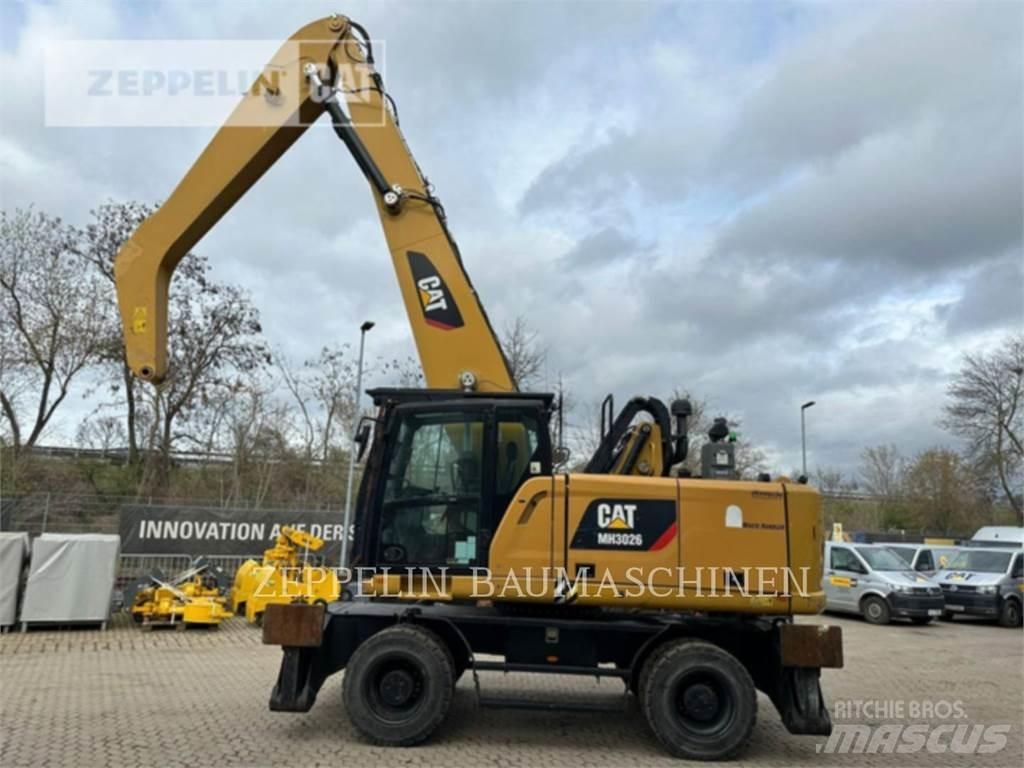 CAT MH3026-06C Demontāžas ekskavators