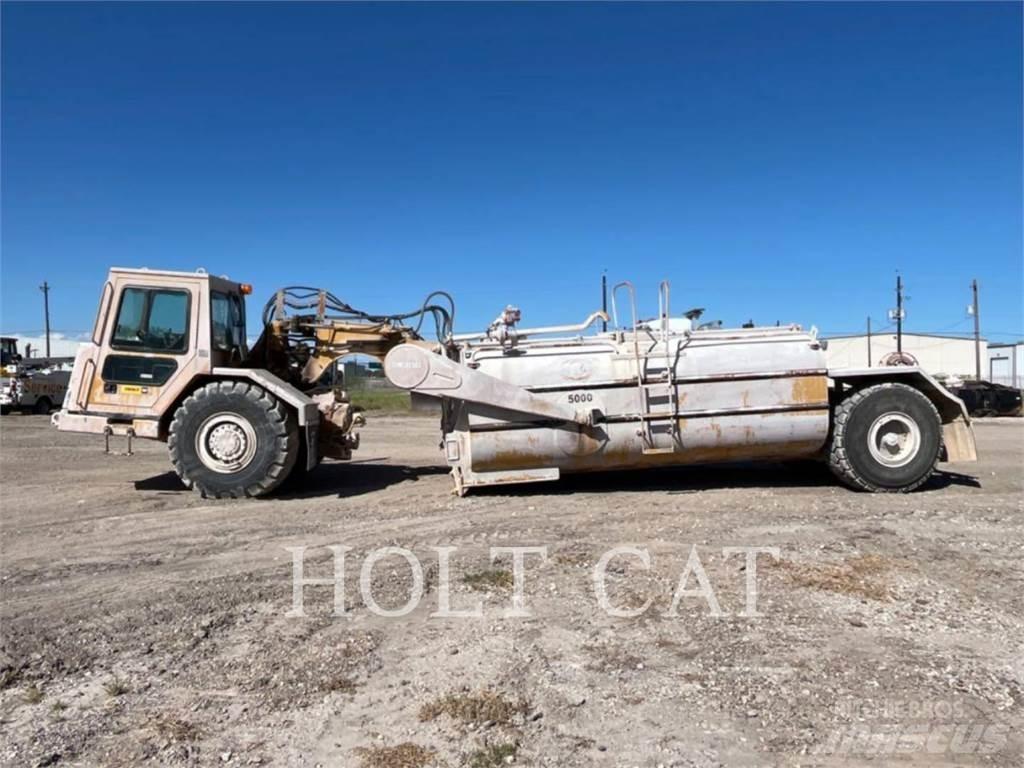 CAT W00 613CII Skrēperi