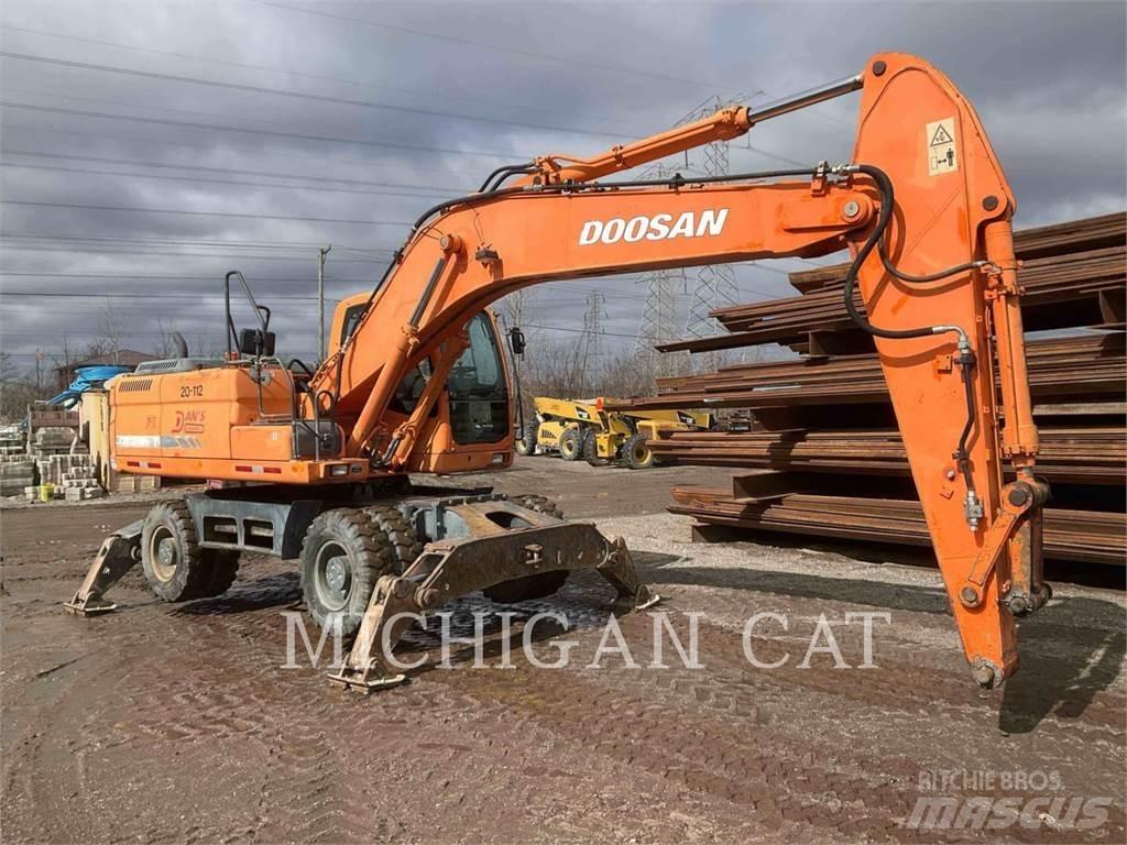 Doosan DX210W Ekskavatori uz riteņiem
