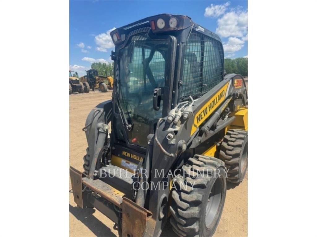 Ford / New Holland L318 Lietoti riteņu kompaktiekrāvēji