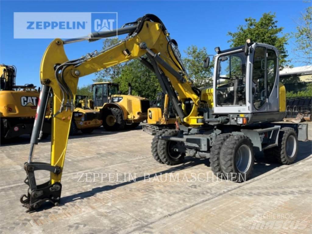 Neuson EW100 Ekskavatori uz riteņiem