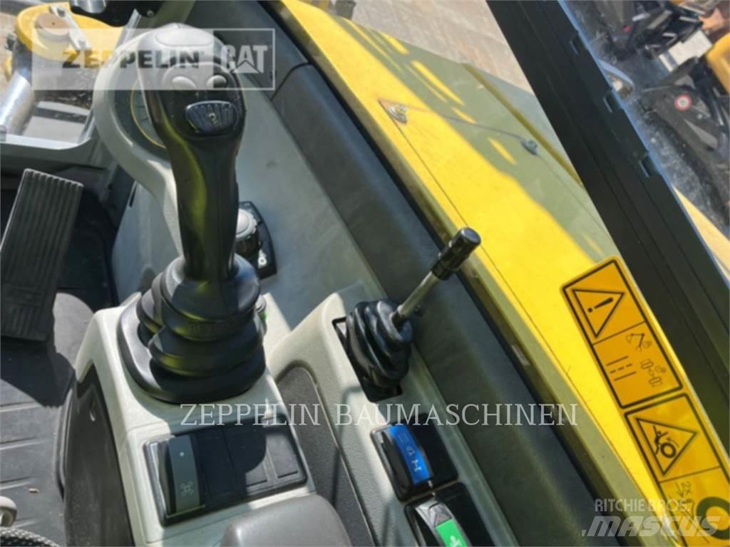Neuson EW100 Ekskavatori uz riteņiem