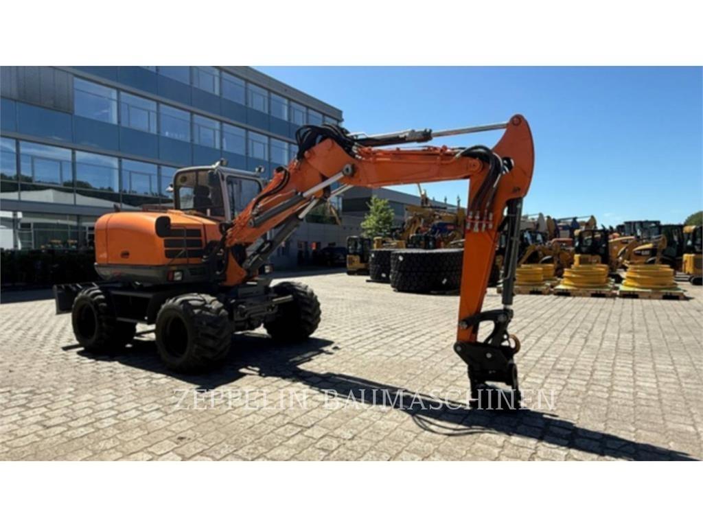 Wacker EW100 Ekskavatori uz riteņiem